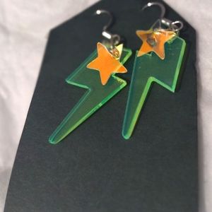 Black light reactive dangle pierced earrings